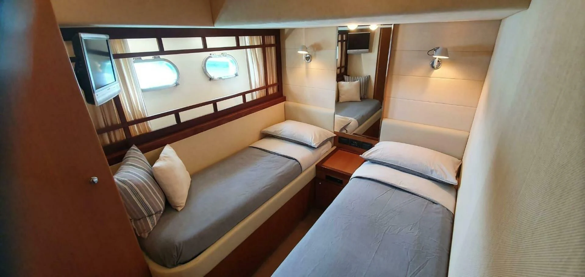 a room with two beds aboard SEDROP Yacht for Sale