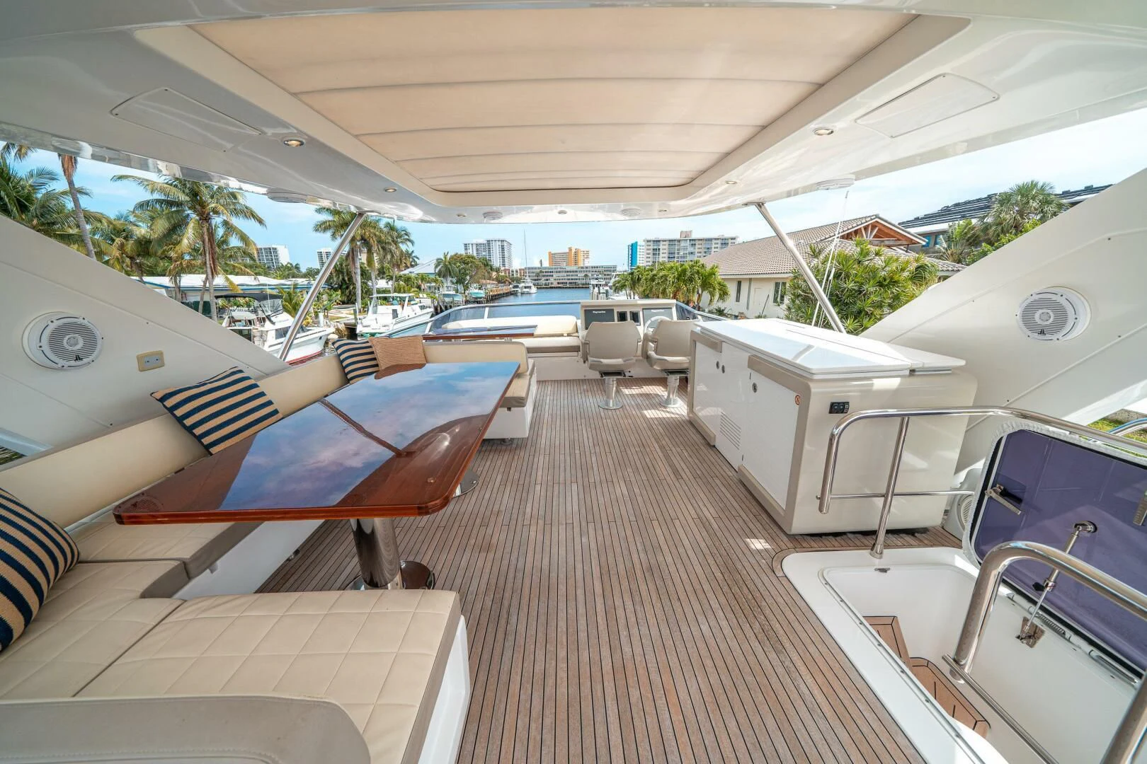a deck with a deck and chairs aboard VELOCITY Yacht for Sale