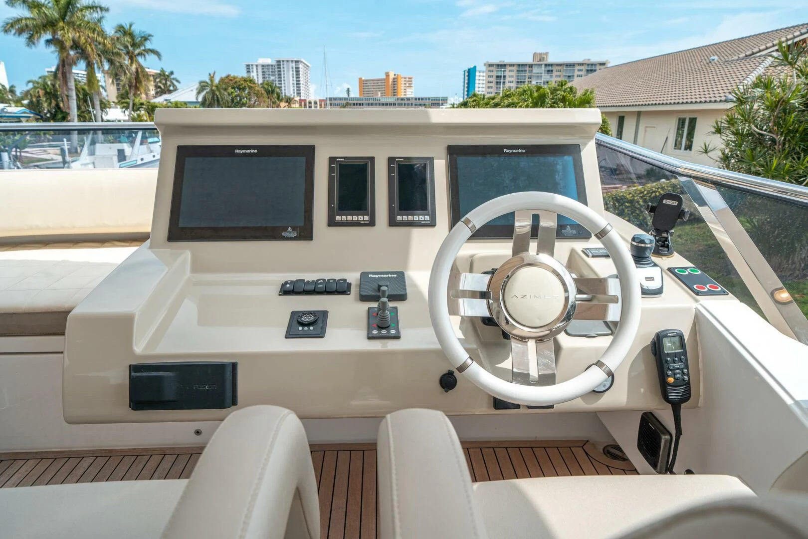 a white car with a screen aboard VELOCITY Yacht for Sale