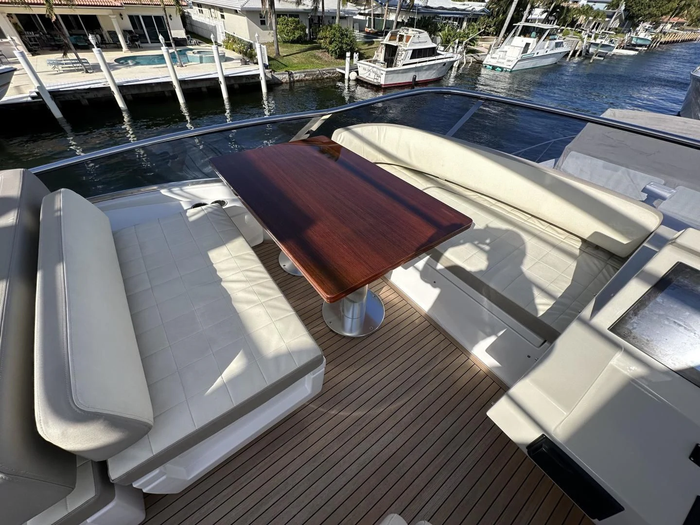 a deck with a boat and a dock aboard VELOCITY Yacht for Sale