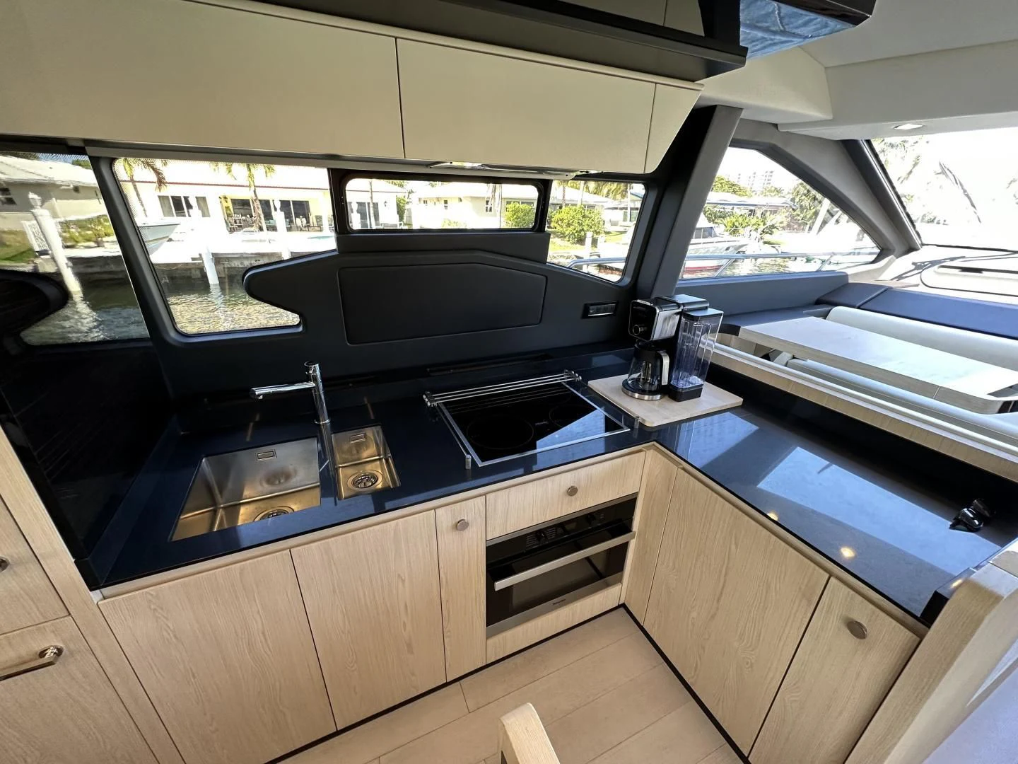 a kitchen with a large window aboard VELOCITY Yacht for Sale