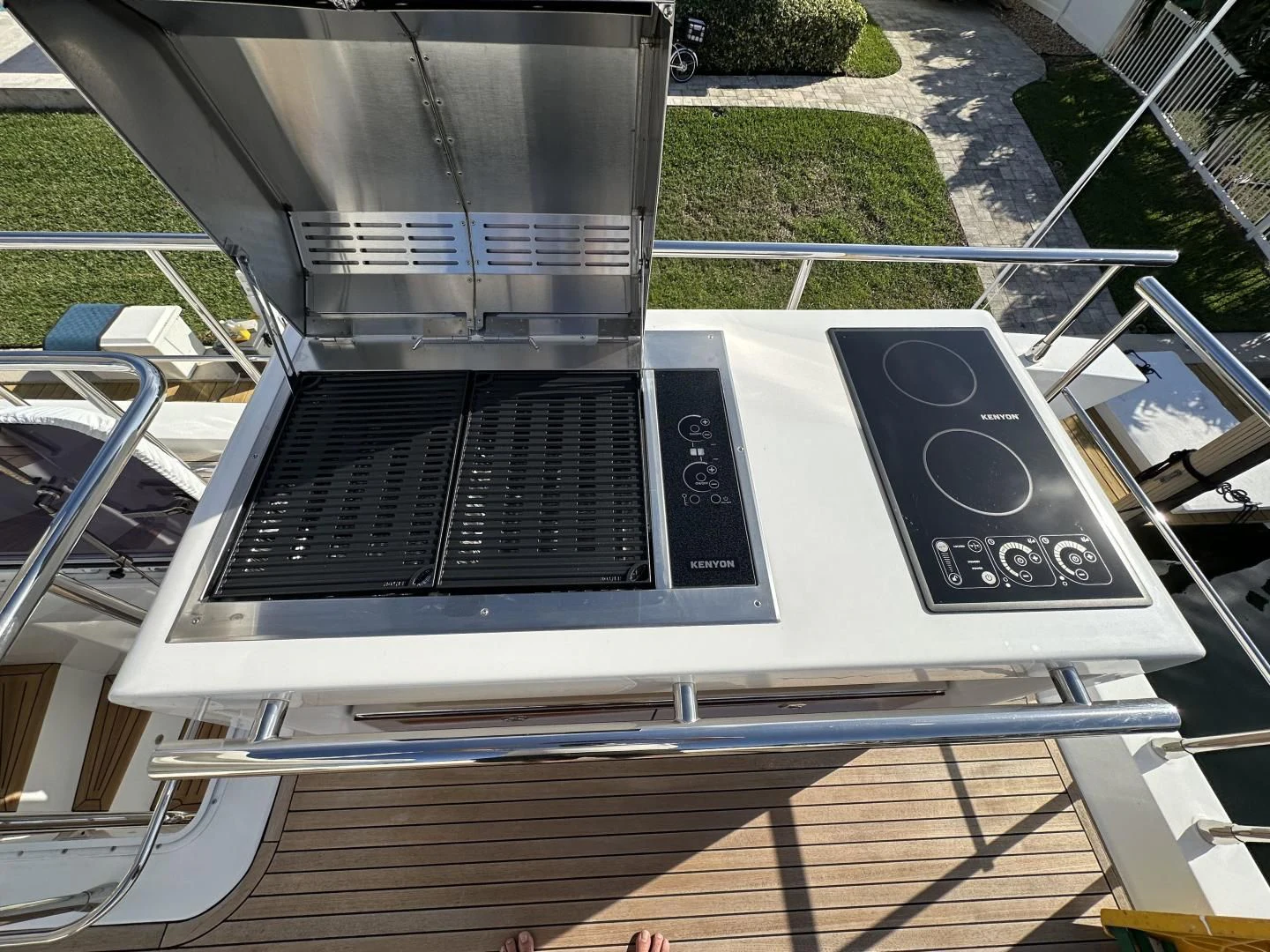 a black laptop on a table aboard VELOCITY Yacht for Sale