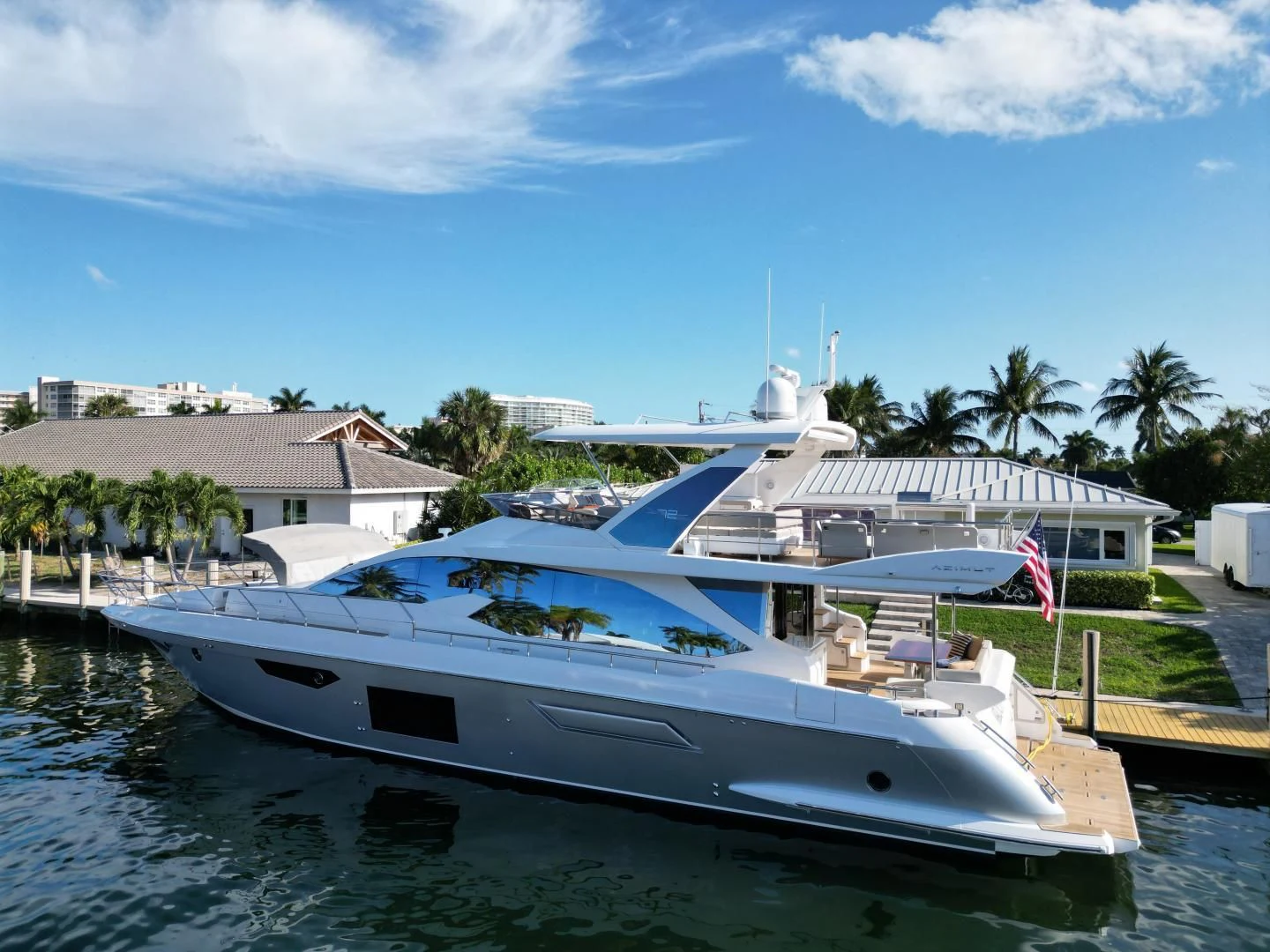 a boat docked at a pier aboard VELOCITY Yacht for Sale