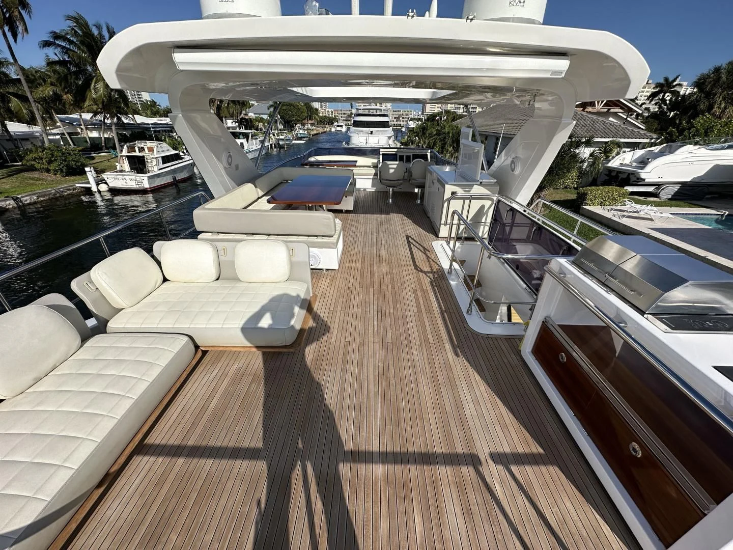 a deck with a couch and a pool aboard VELOCITY Yacht for Sale