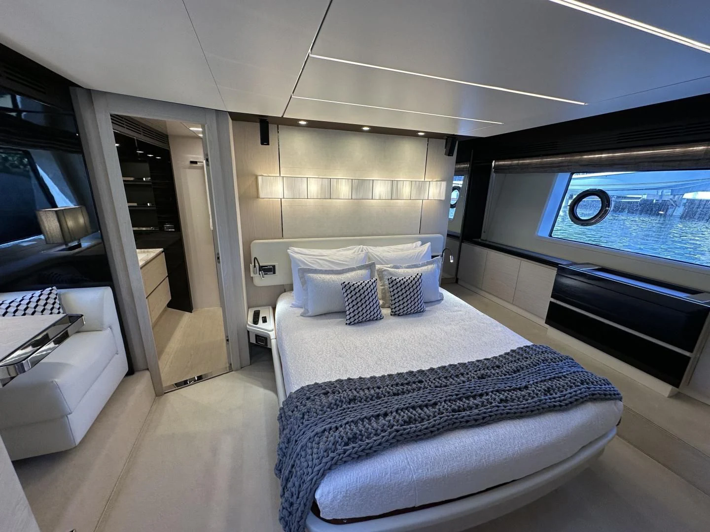 a room with a bed and a tv aboard VELOCITY Yacht for Sale