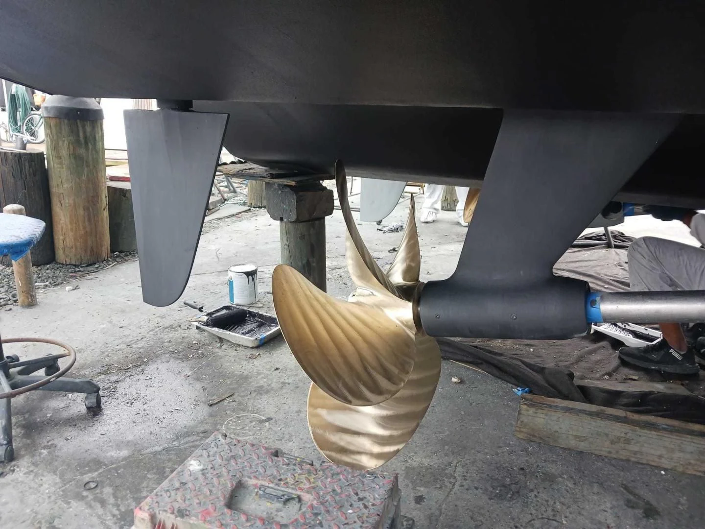 a cat under a car aboard VELOCITY Yacht for Sale