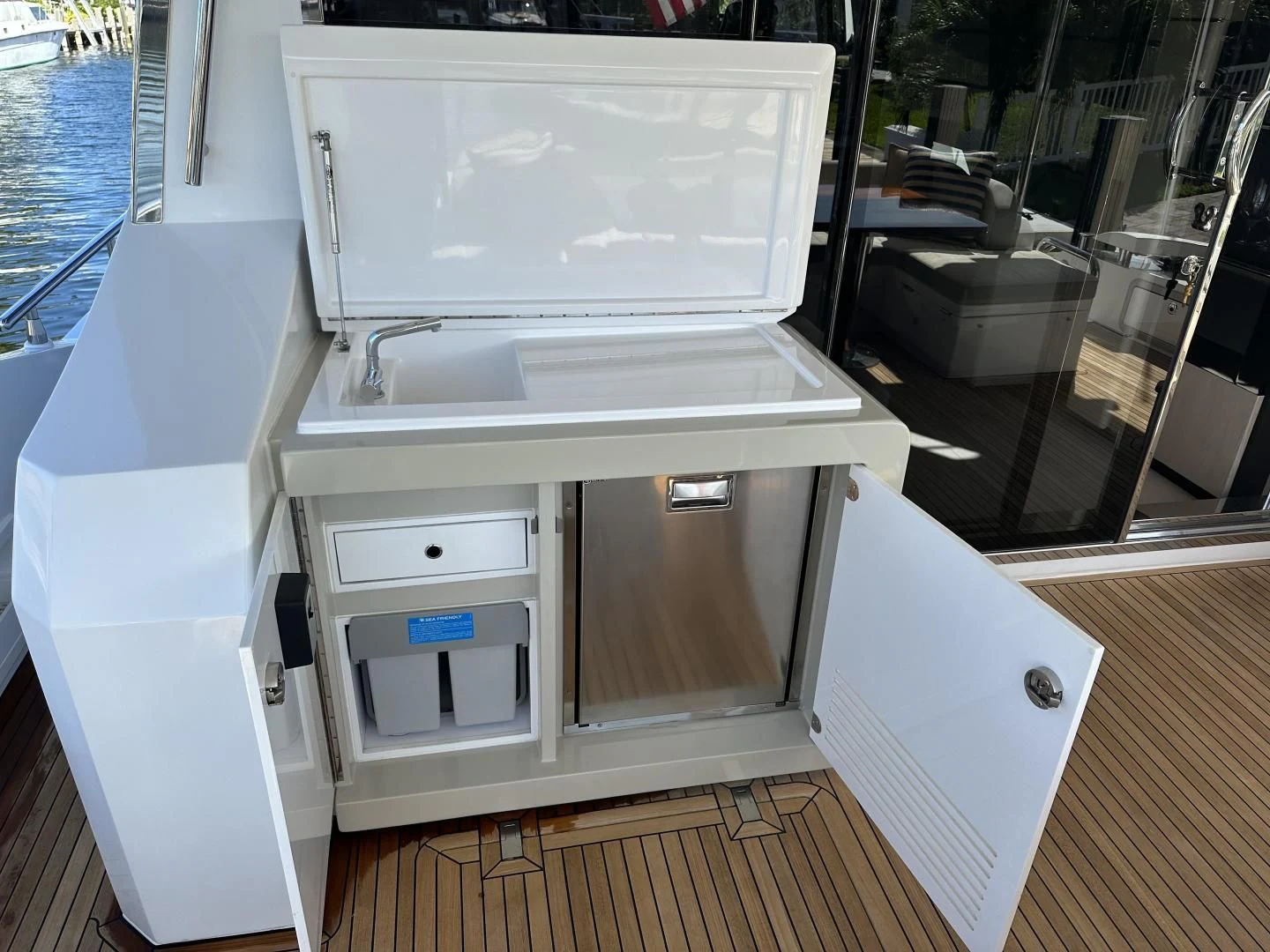 a white refrigerator in a kitchen aboard VELOCITY Yacht for Sale