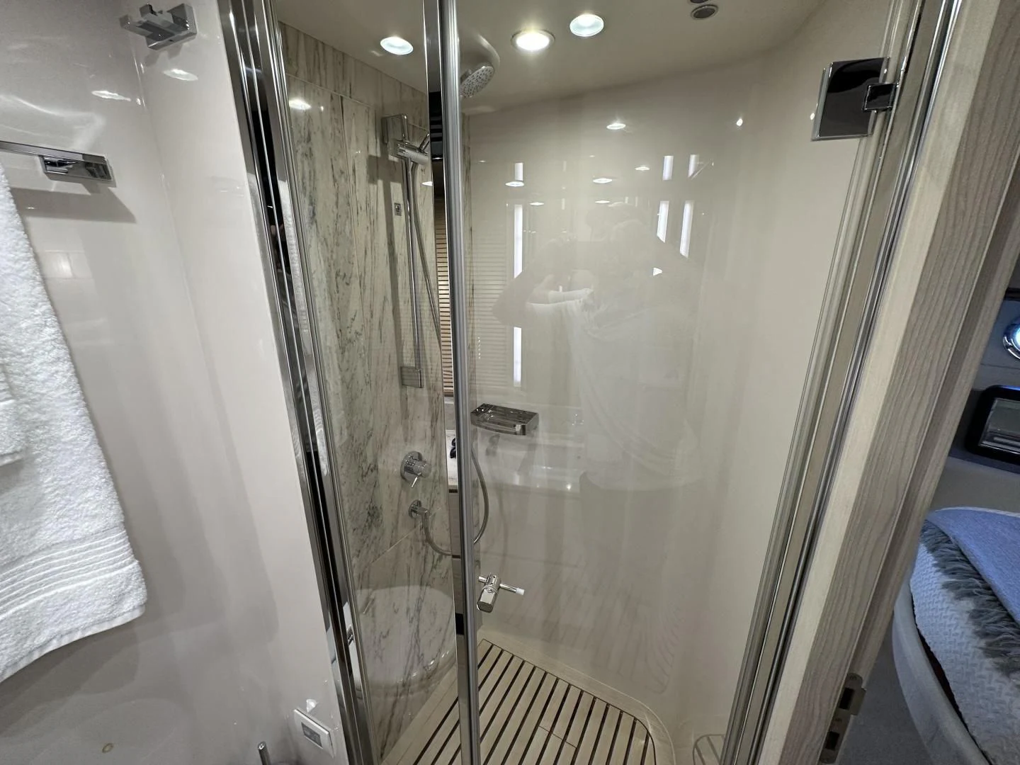 a shower unit with glass doors aboard VELOCITY Yacht for Sale