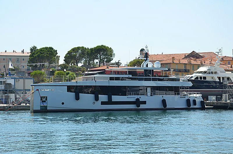 a large white boat on the water aboard QUINTET Yacht for Sale