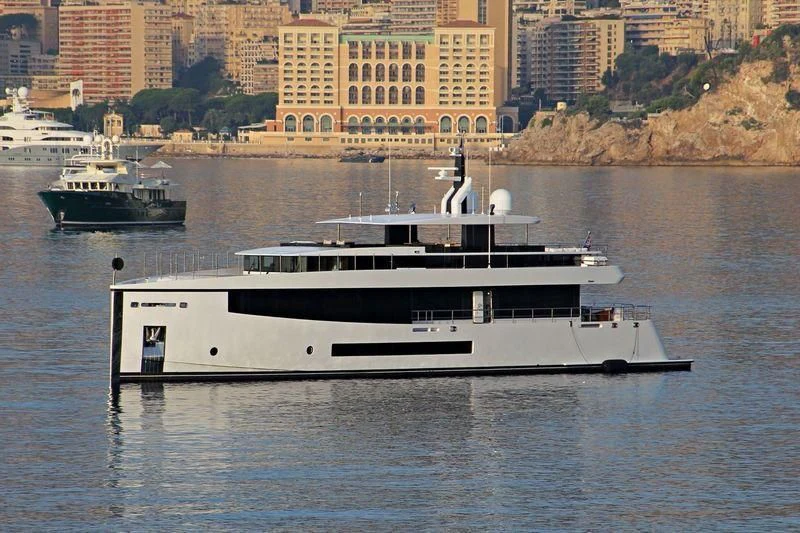 a large white boat in the water aboard QUINTET Yacht for Sale