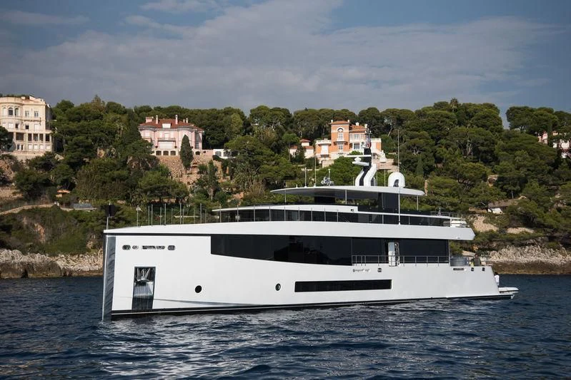 a white boat on water aboard QUINTET Yacht for Sale