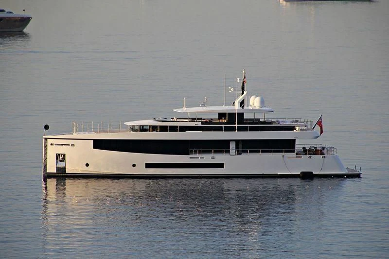 a large white boat in the water aboard QUINTET Yacht for Sale