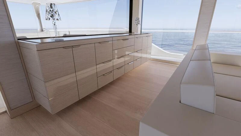 a room with a large window and a wood desk aboard AZURE III Yacht for Sale