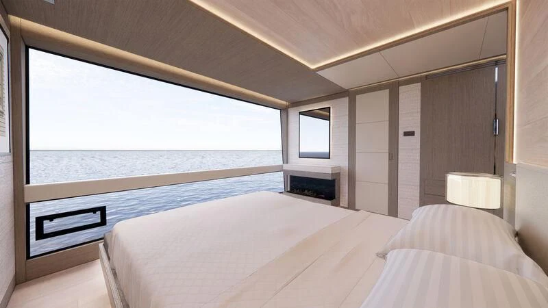 a room with a bed and a window aboard AZURE III Yacht for Sale
