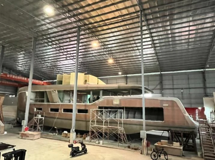 a large warehouse with a few large beams of light aboard AZURE III Yacht for Sale