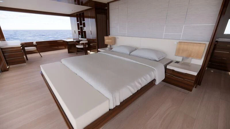 a room with a bed and a table and chairs aboard AZURE III Yacht for Sale