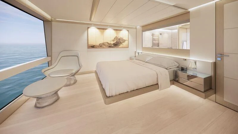 a room with a bed and a chair aboard AZURE III Yacht for Sale