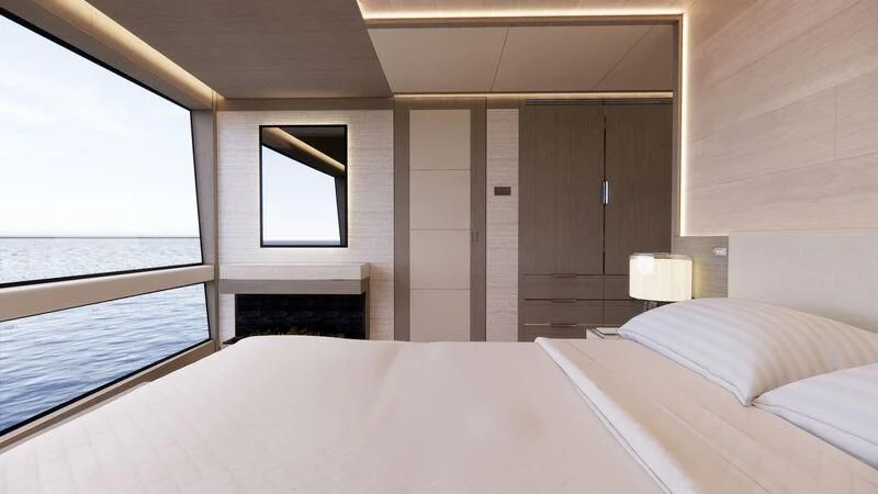 a room with a bed and a window aboard AZURE III Yacht for Sale