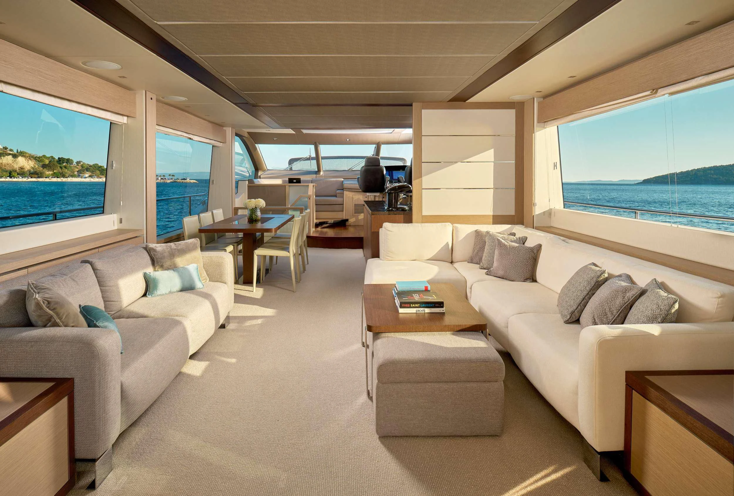 a living room with a large window aboard HIDEAWAY Yacht for Charter