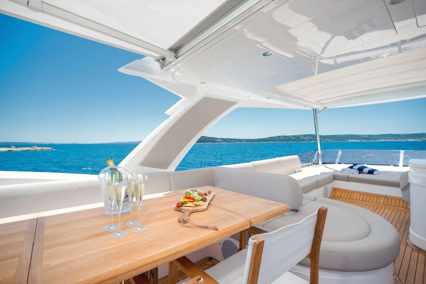 a table and chairs on a boat aboard HIDEAWAY Yacht for Charter