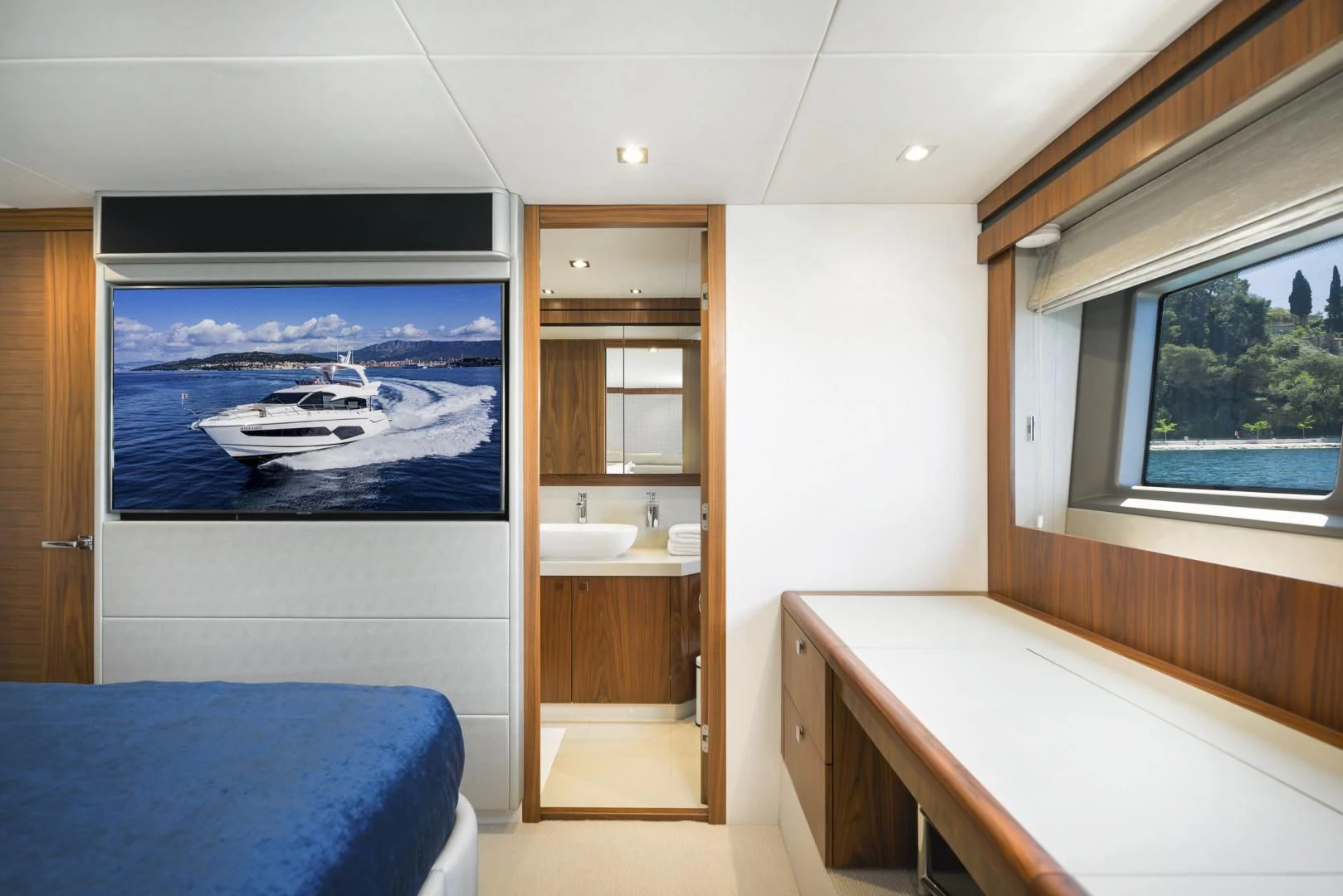 a room with a bed and a sink aboard HIDEAWAY Yacht for Charter