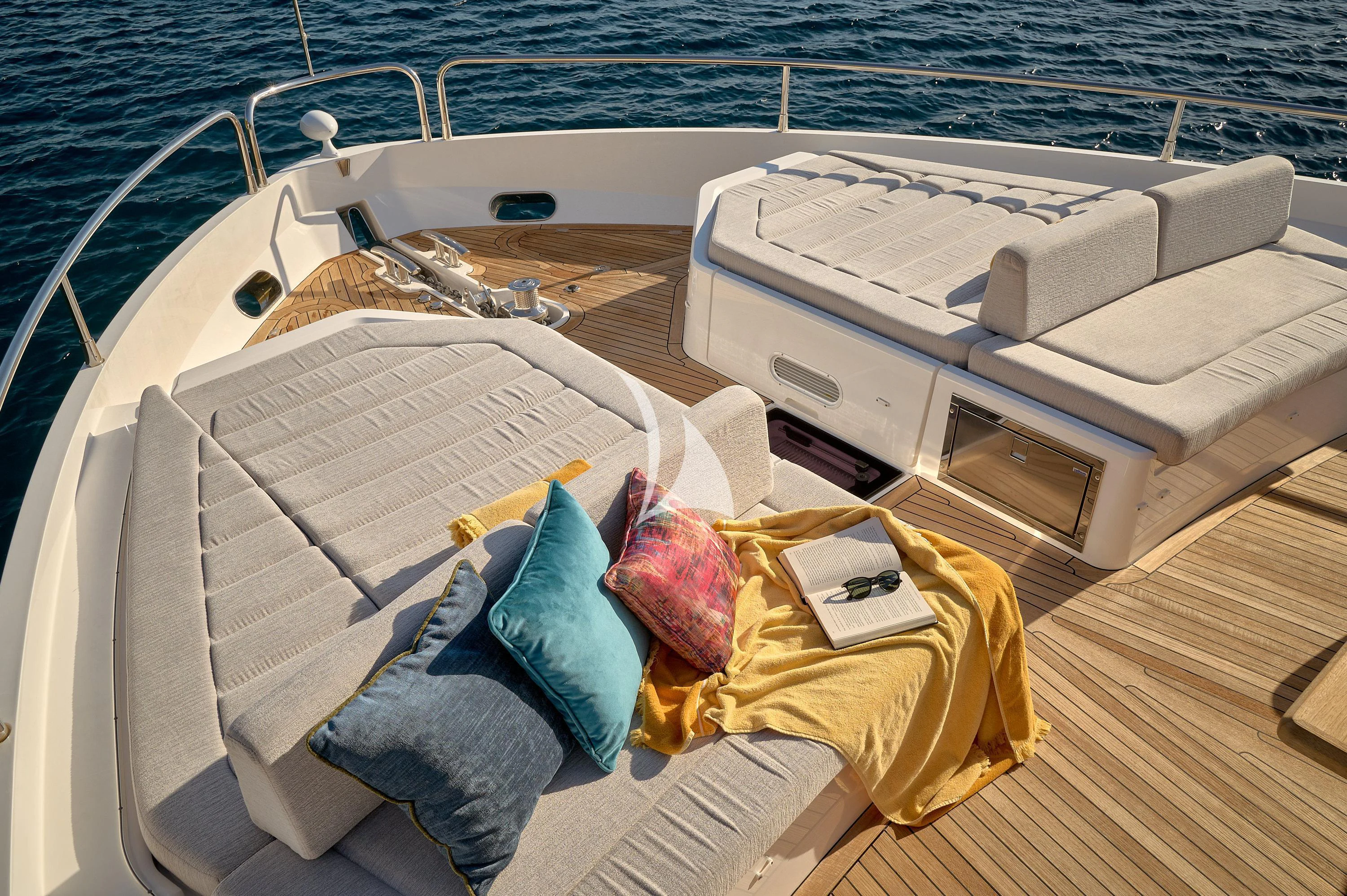 a boat with pillows on the deck aboard HIDEAWAY Yacht for Charter