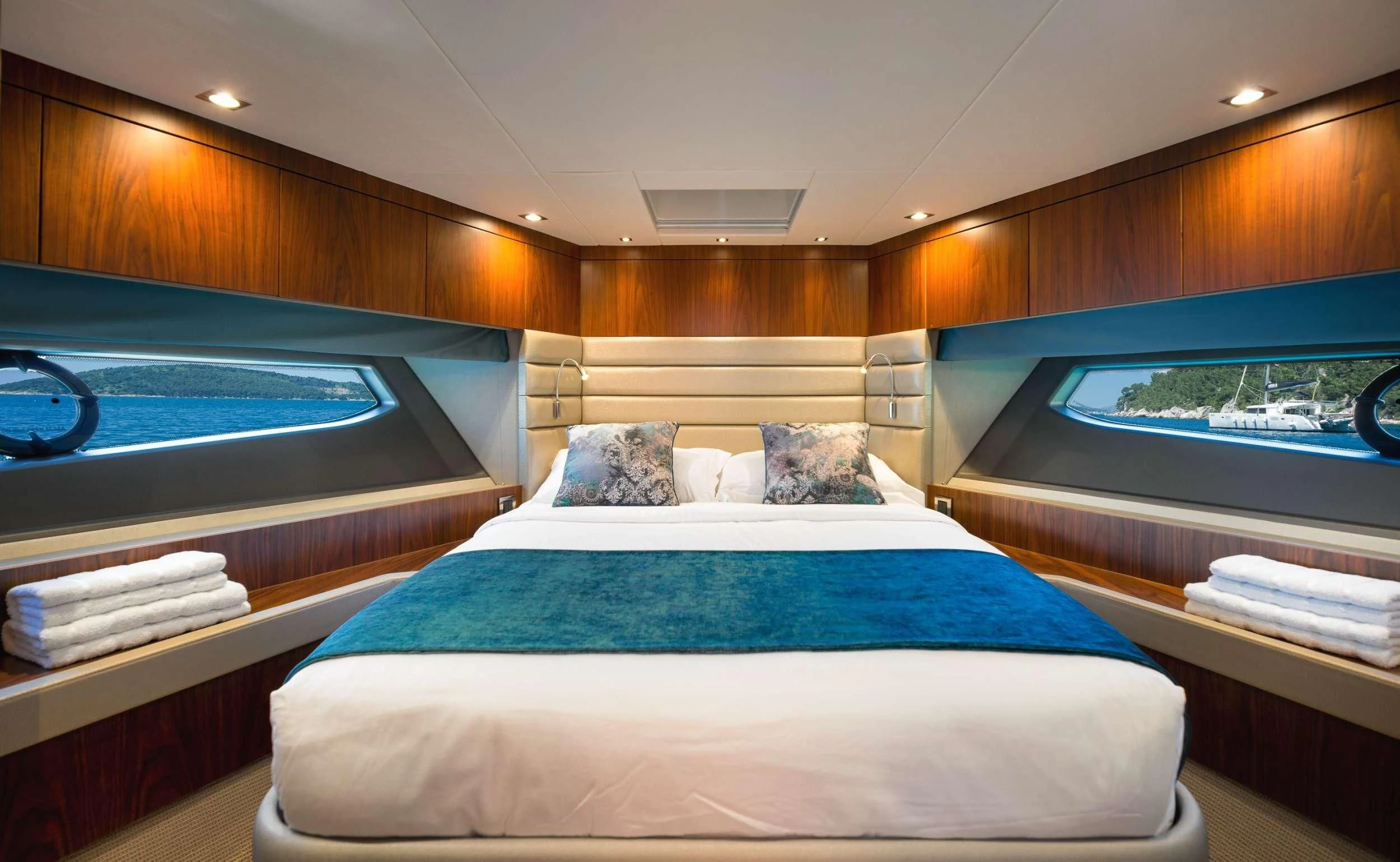 a room with a bed and a pool aboard HIDEAWAY Yacht for Charter