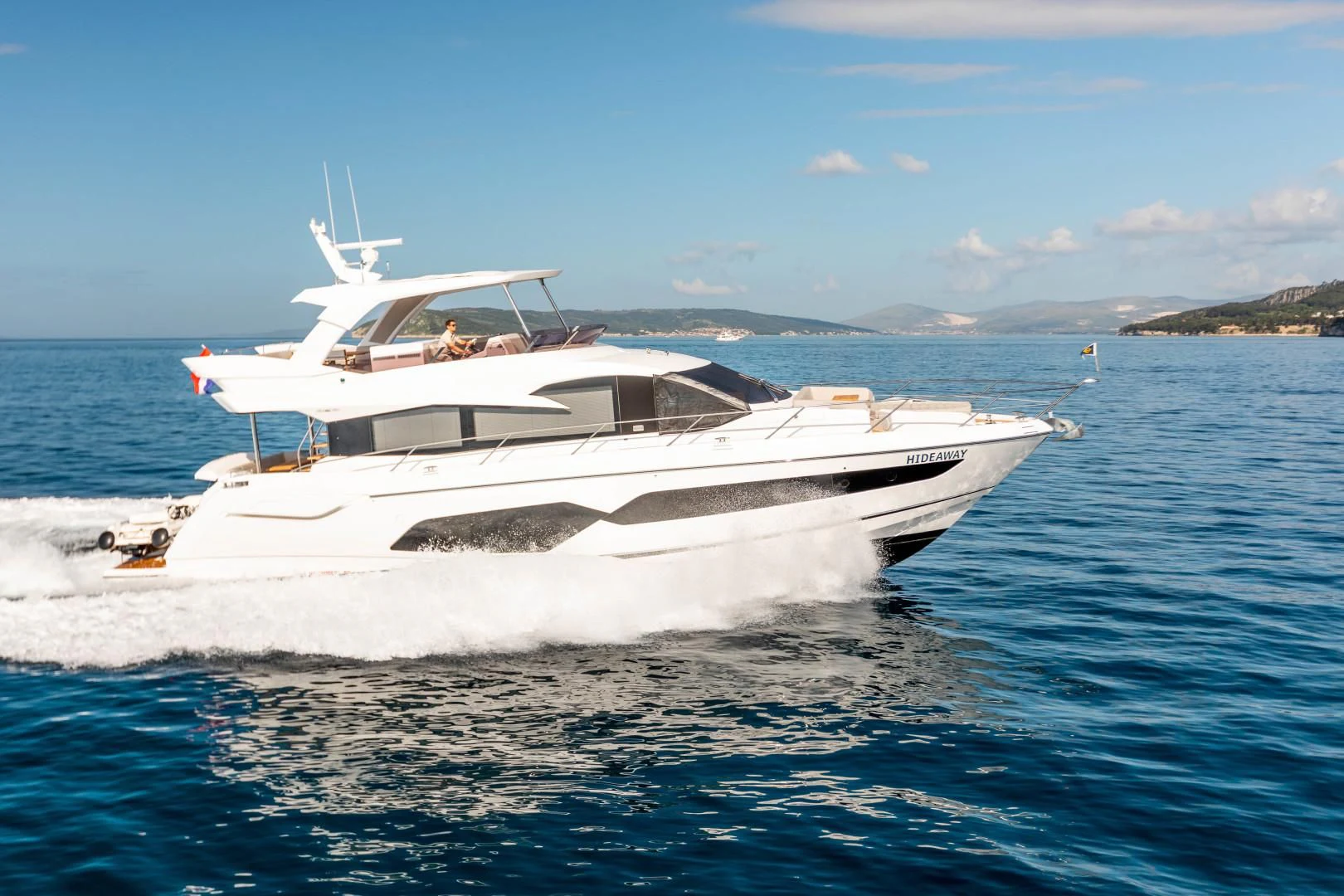 a boat on the water aboard HIDEAWAY Yacht for Charter