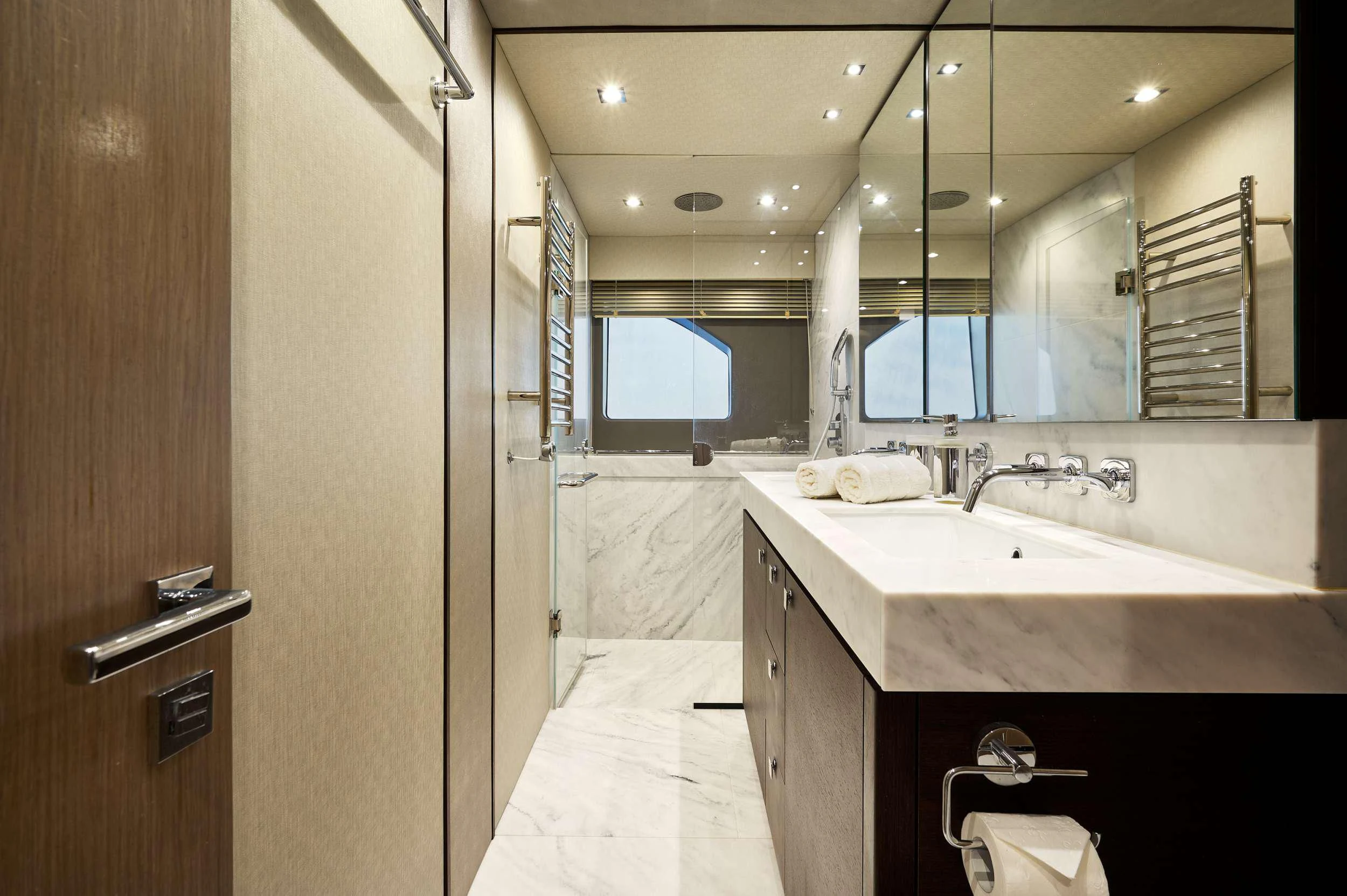 a bathroom with a large mirror aboard HIDEAWAY Yacht for Charter