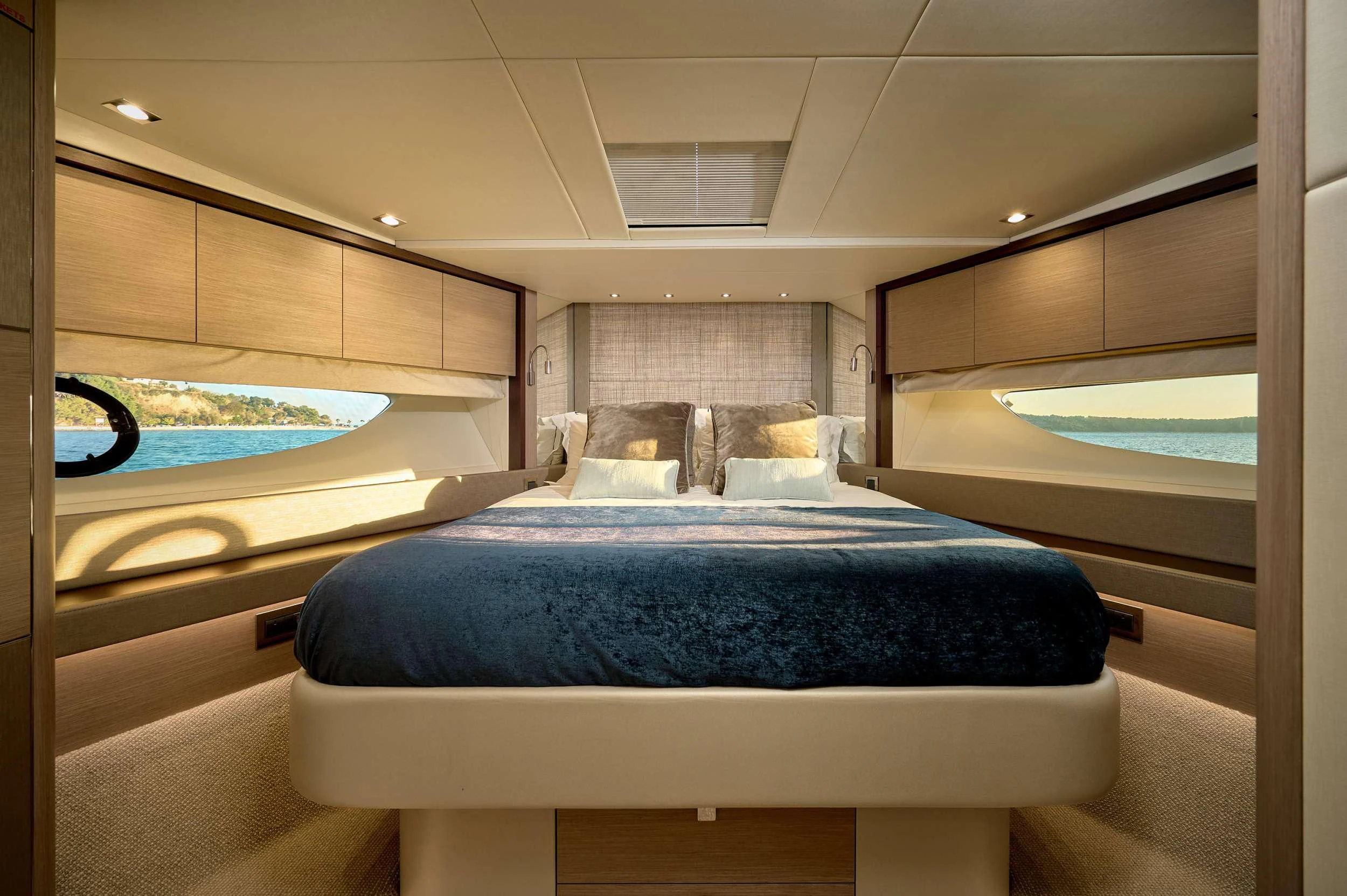 a room with a bed and a pool aboard HIDEAWAY Yacht for Charter