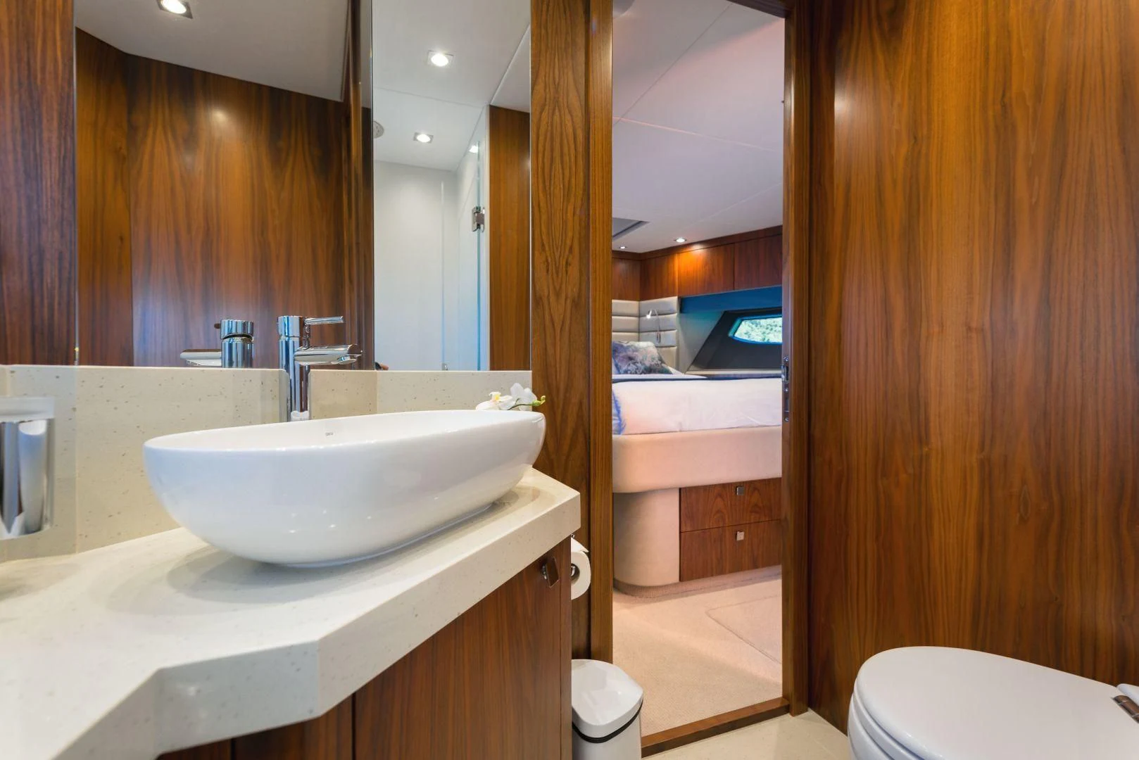 a bathroom with a sink and a bathtub aboard HIDEAWAY Yacht for Charter