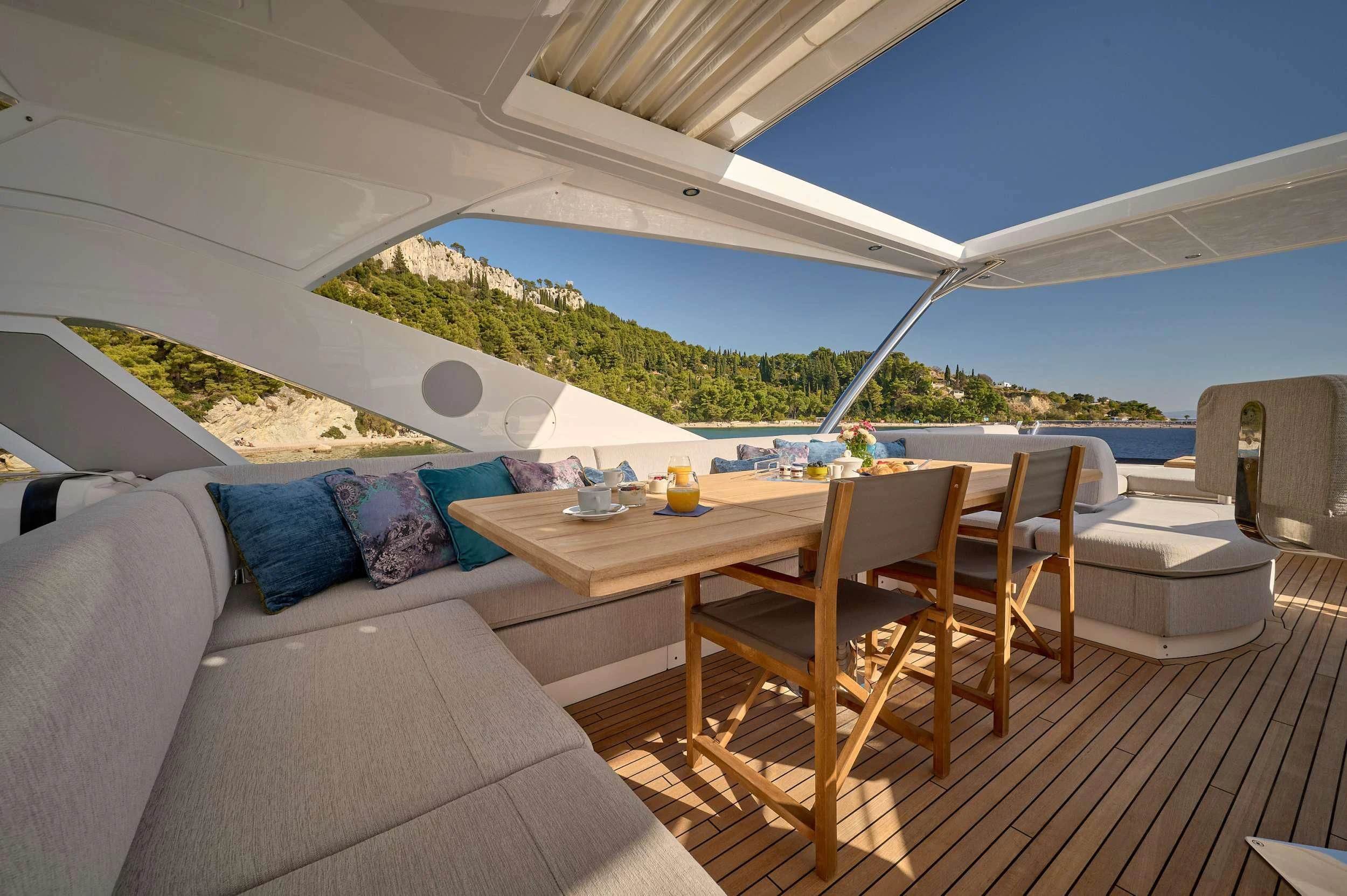 a tent with a table and chairs aboard HIDEAWAY Yacht for Charter