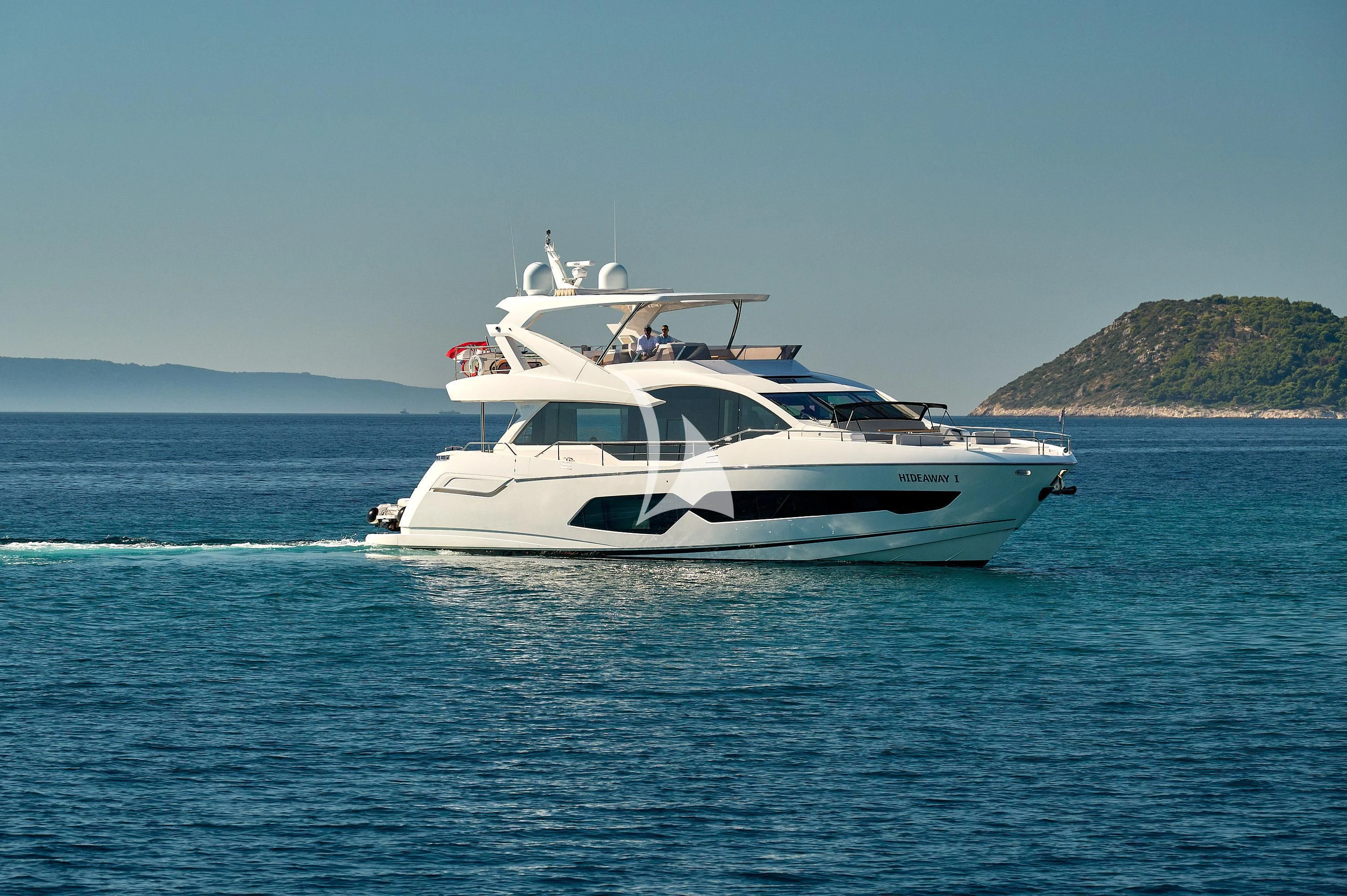 a white yacht on the water aboard HIDEAWAY Yacht for Charter