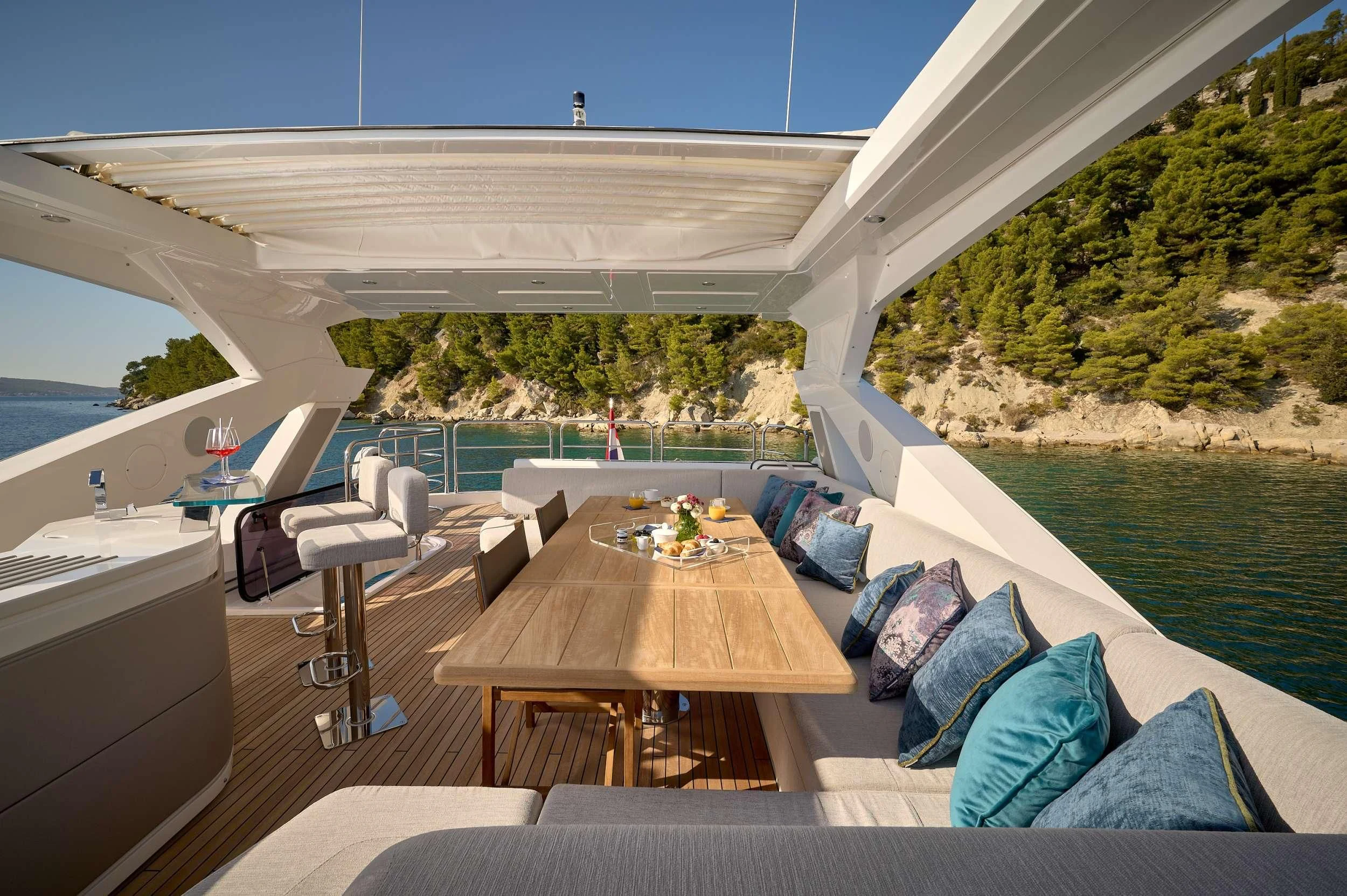 a room with a table and chairs aboard HIDEAWAY Yacht for Charter