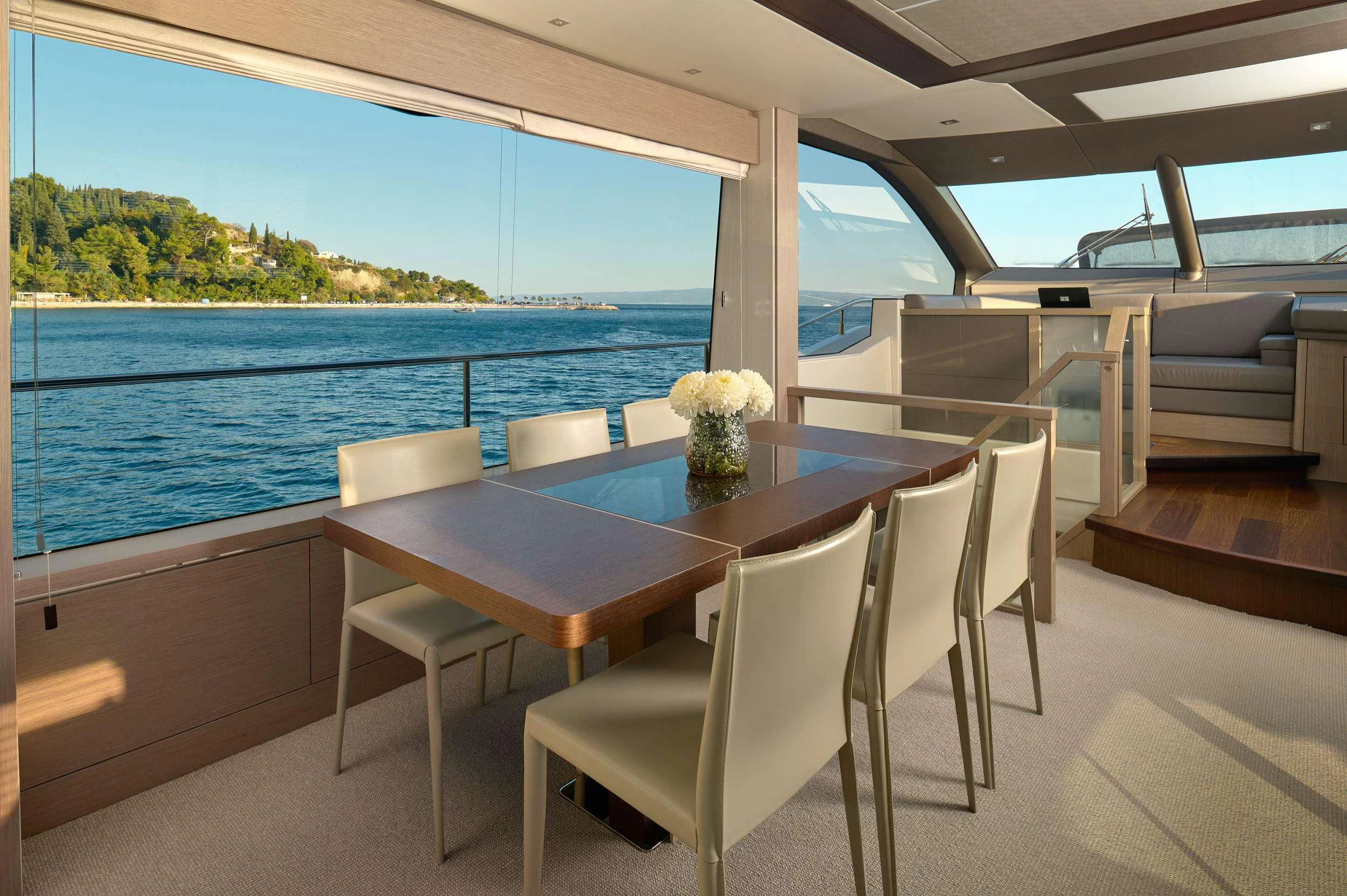 a room with a table and chairs aboard HIDEAWAY Yacht for Charter