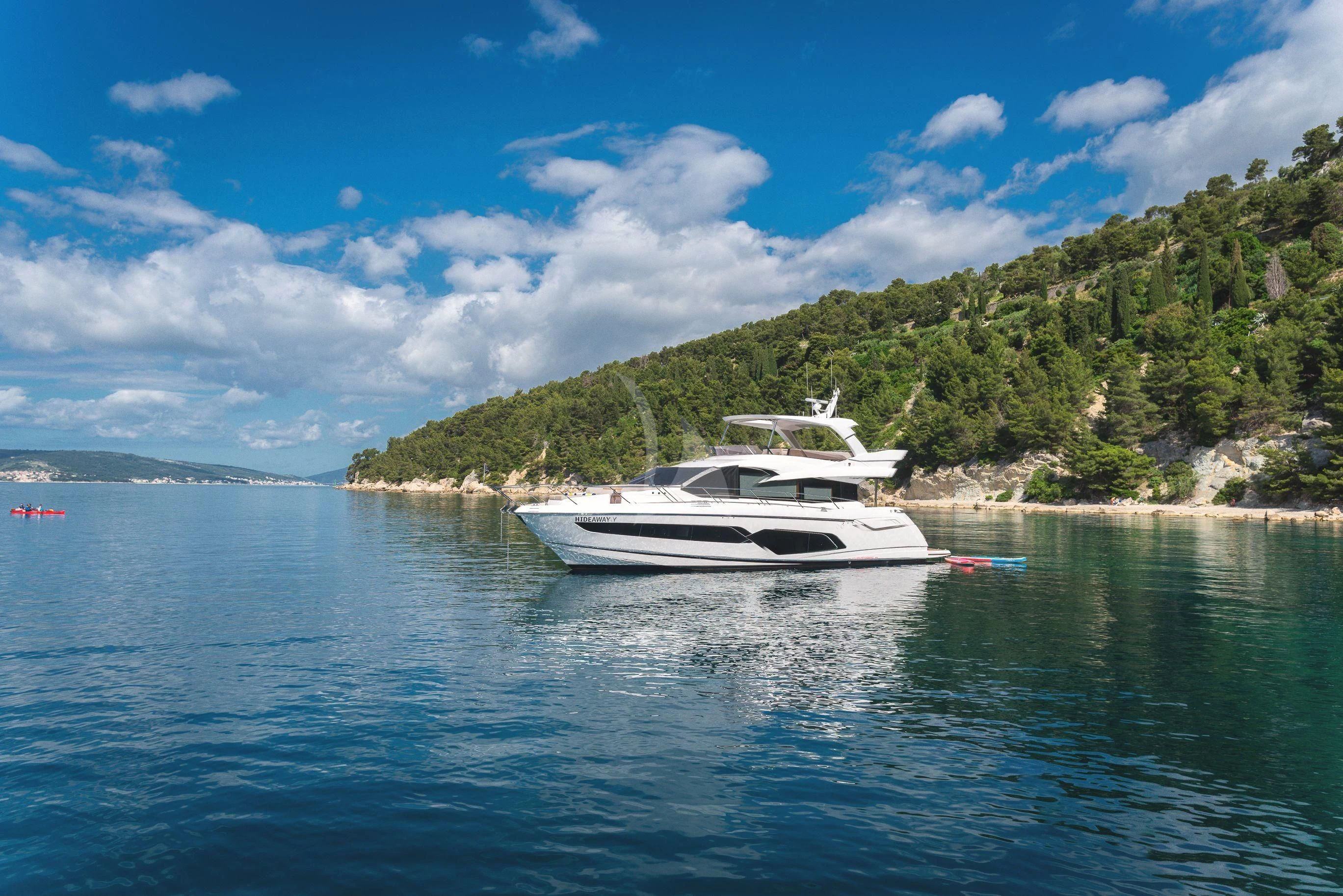 a boat on the water aboard HIDEAWAY Yacht for Charter