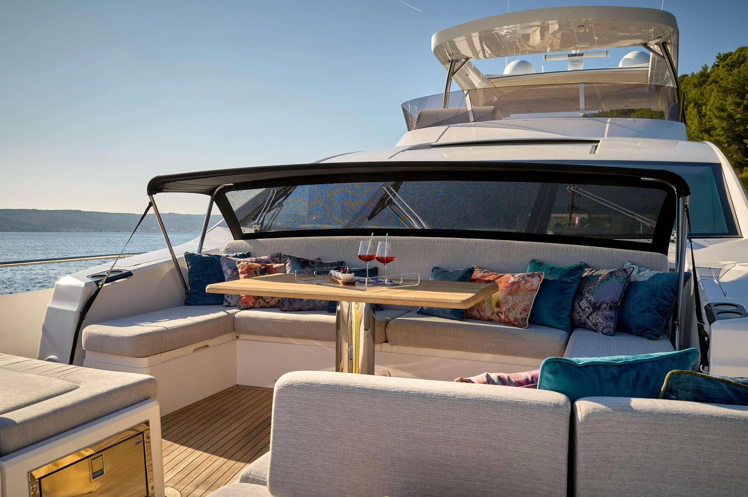 a car with a table and chairs aboard HIDEAWAY Yacht for Charter