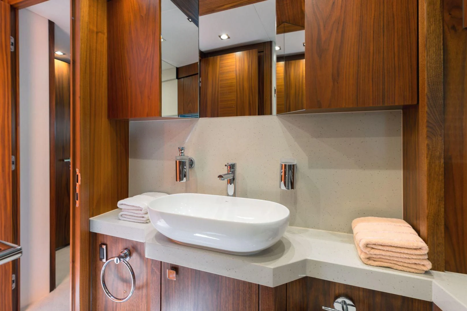 a bathroom with a sink and a mirror aboard HIDEAWAY Yacht for Charter