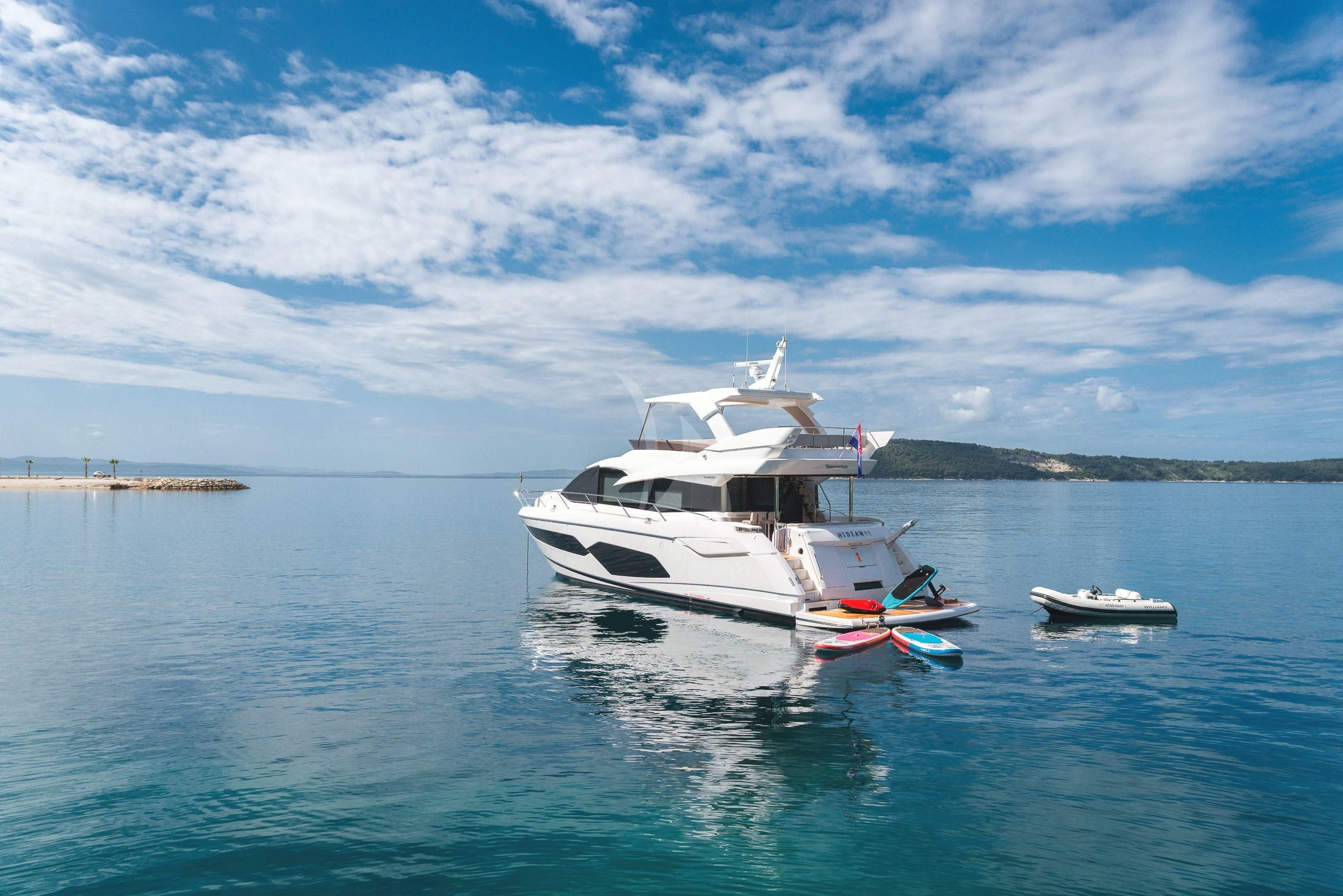 a boat on the water aboard HIDEAWAY Yacht for Charter