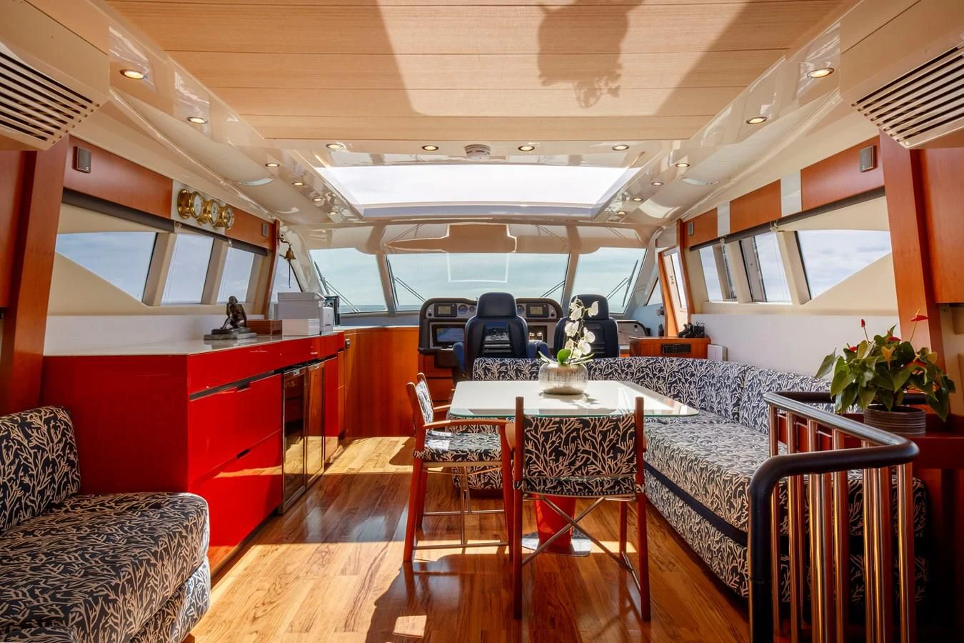 a room with a table and chairs aboard TRUE AUSTRIAN Yacht for Sale
