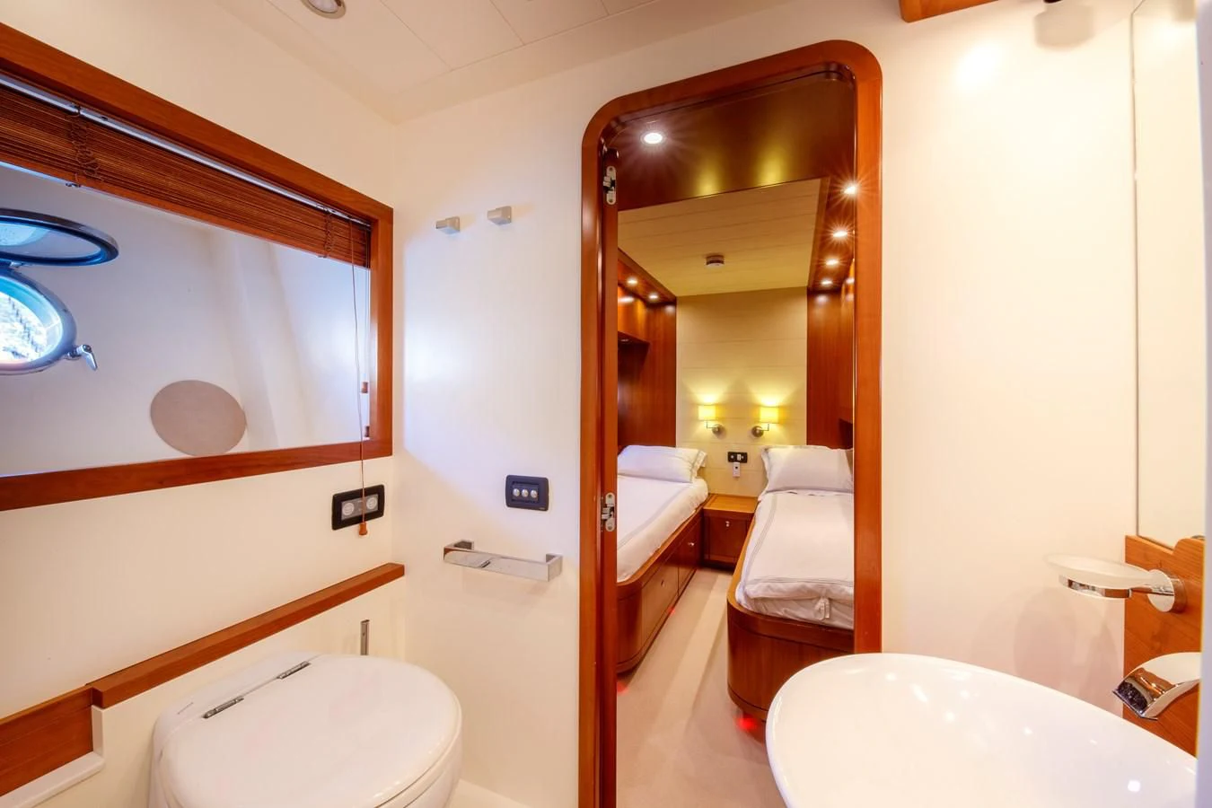 a bathroom with a mirror and a sink aboard TRUE AUSTRIAN Yacht for Sale
