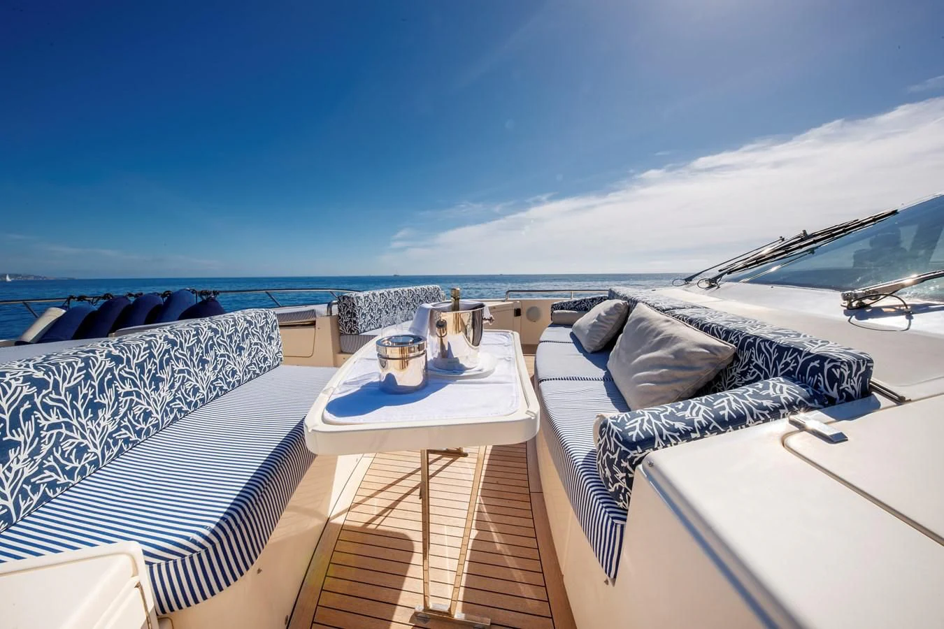a balcony with a view of the ocean and the ocean aboard TRUE AUSTRIAN Yacht for Sale