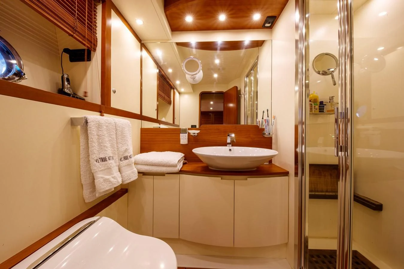 a bathroom with a shower unit and sink aboard TRUE AUSTRIAN Yacht for Sale