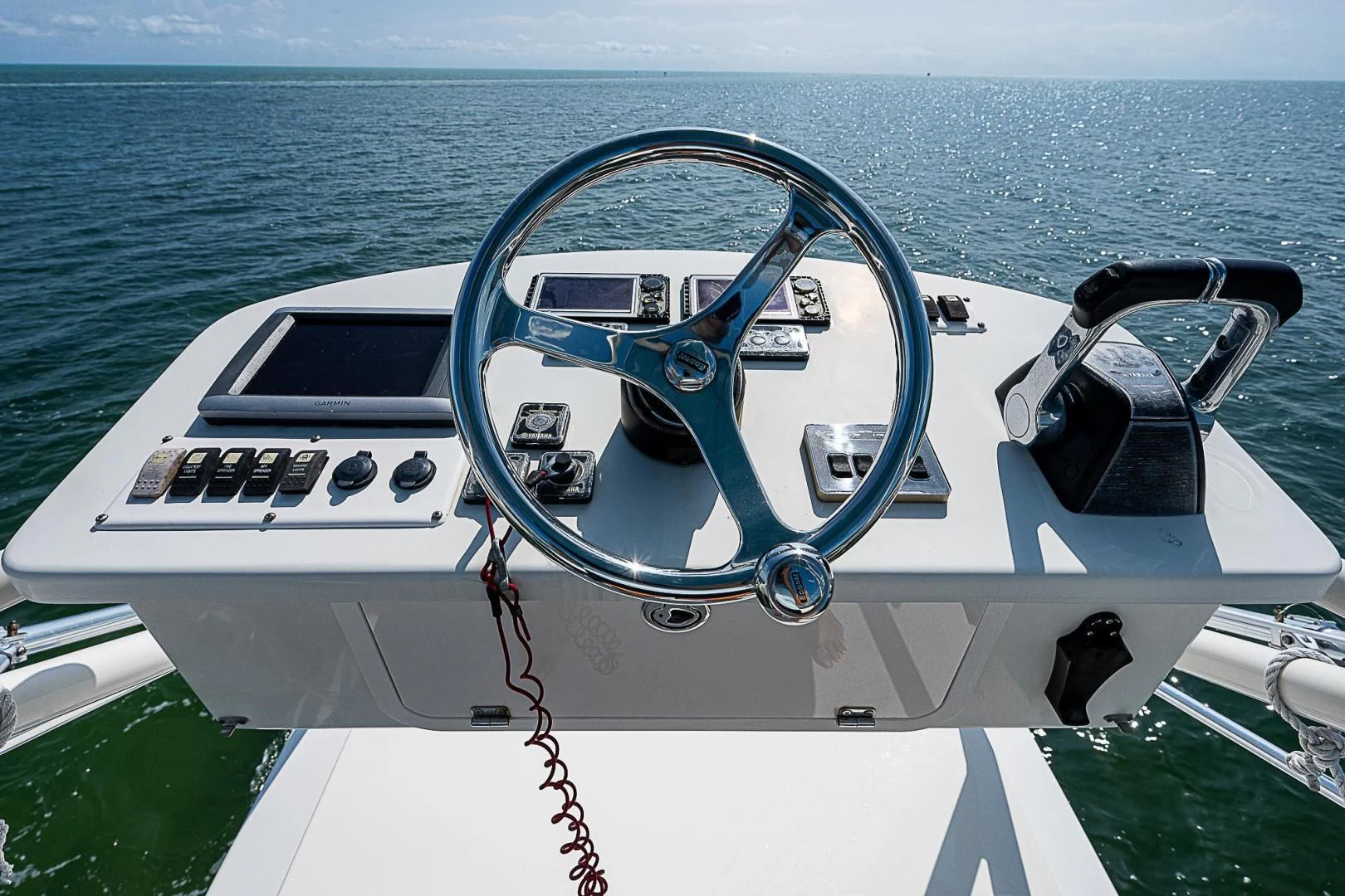 the steering wheel of a boat aboard S3XY Yacht for Sale