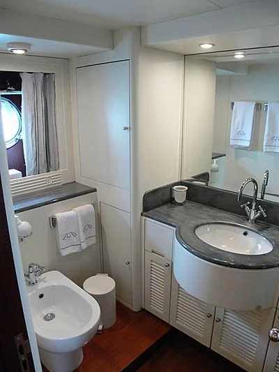 a bathroom with a sink and a toilet aboard LADY IN BLUE Yacht for Sale