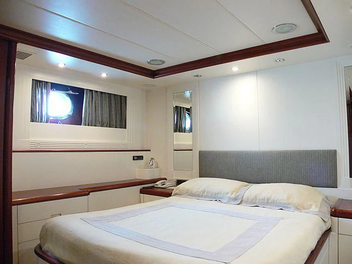 a room with two beds aboard LADY IN BLUE Yacht for Sale