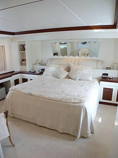 a bedroom with a bed aboard LADY IN BLUE Yacht for Sale