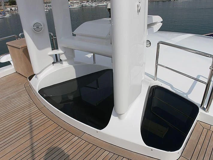 a white bathtub with a black rectangular object on it aboard LADY IN BLUE Yacht for Sale