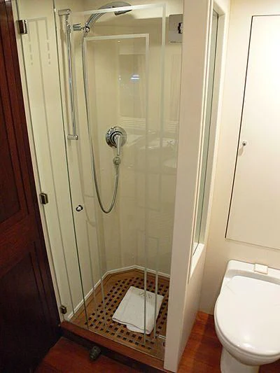 a shower with a mirror aboard LADY IN BLUE Yacht for Sale