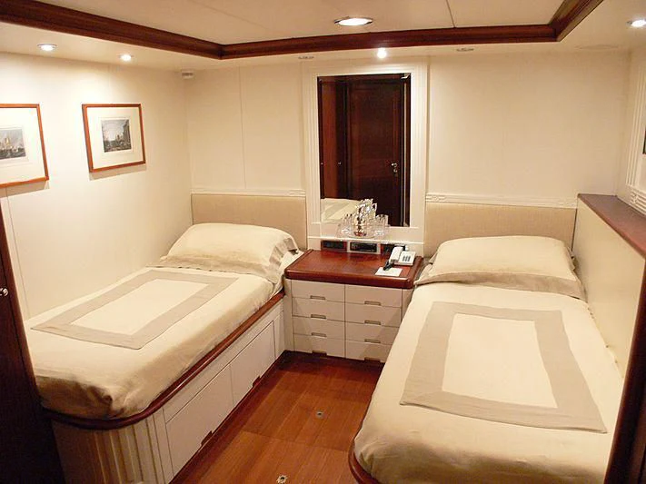 a room with two beds aboard LADY IN BLUE Yacht for Sale